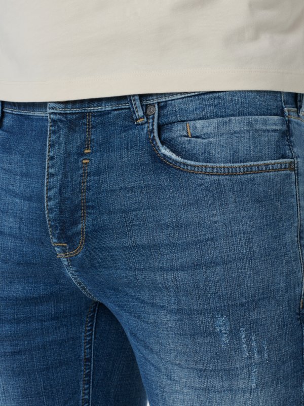 SLIM FIT STRETCH DENIM DESTROY AND REPAIR