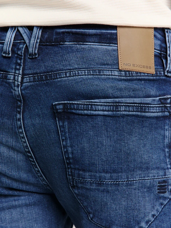 RELAXED FIT STONE USED DENIM DARK BLUE